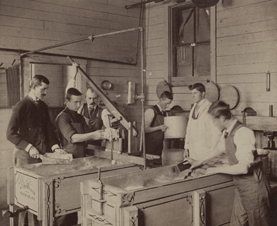 Students make ice cream in the Creamery in the 19th century. Courtesy of Penn State University Archives.