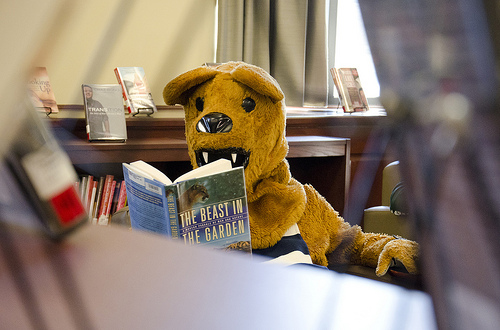 The Nittany Lion enjoying some leisure reading in Pattee-Paterno library on Penn State's University Park campus. Photo courtesy of Penn State News.