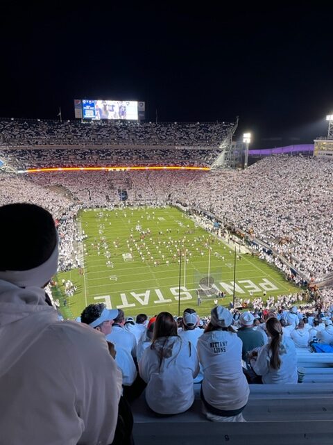 View of the football field at Beaver Stadium from above the crowded seats during a game